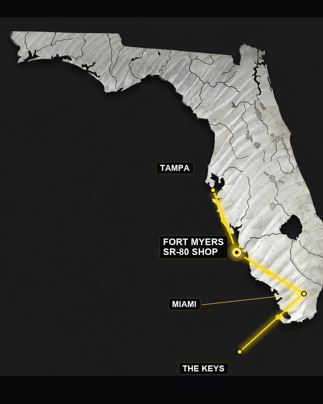 Lee's handmade stainless-steel Florida map showing Tampa, Miami and the Florida Keys with Hydraulics SR-80's Fort Myers shop marked as the destination